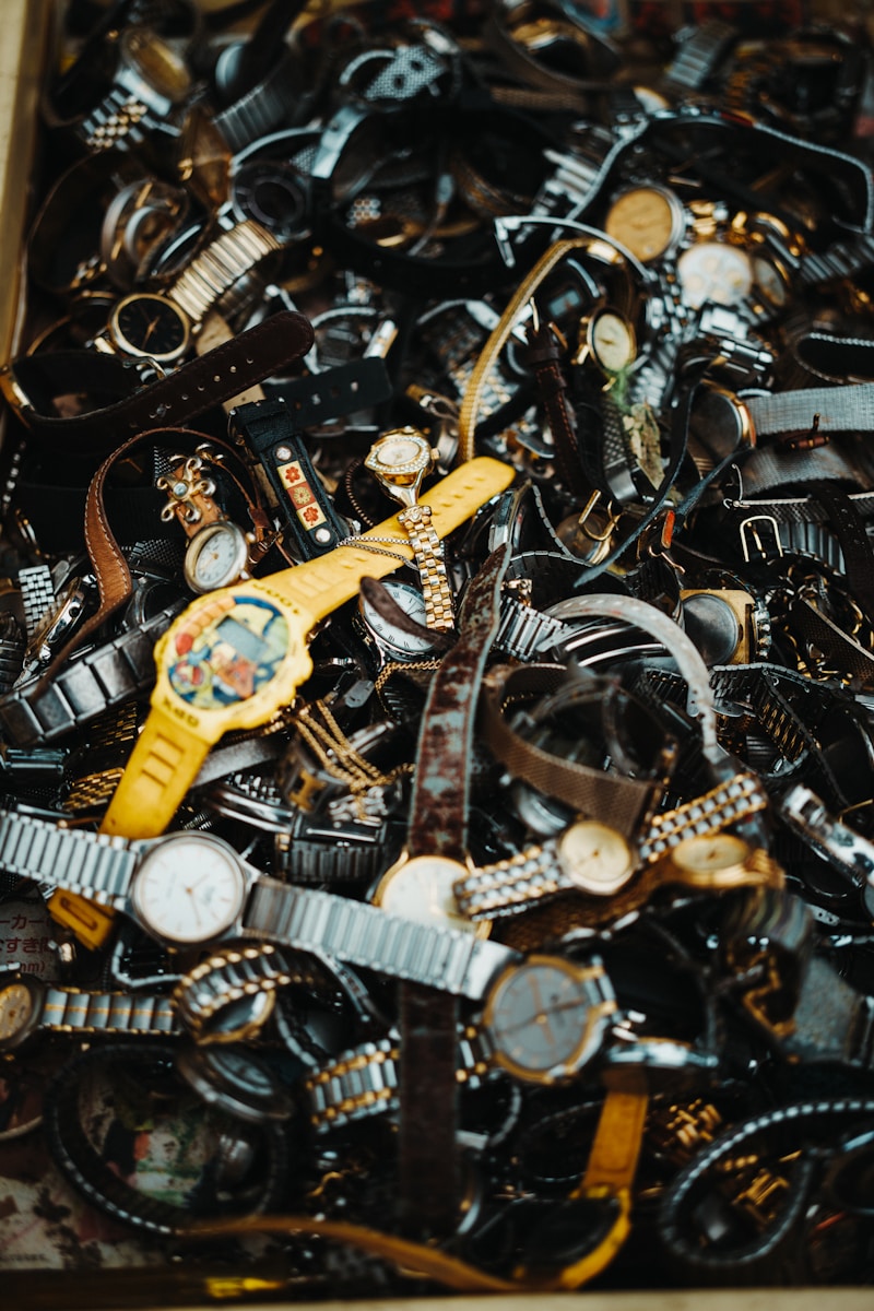 A collection of old watches overlapping each other.